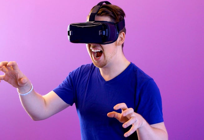 A man wearing a vitual reality headset